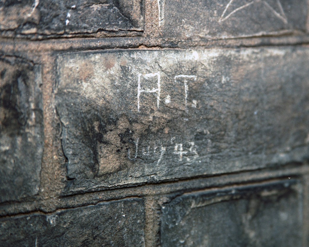 Graffiti on exterior wall (excercise yard)